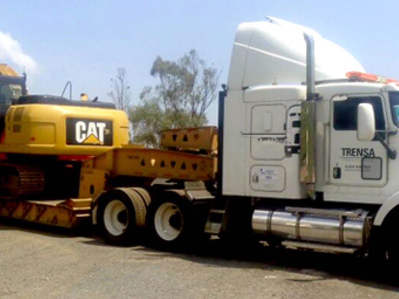 Transporte de excavadora CAT Tlaquepaque